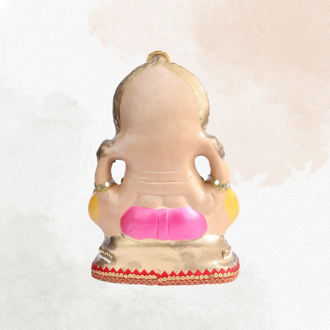 11 Inch – Elegant Seated Ganesha Idol in Pink & Yellow Attire | Shadu Mitti Eco-Friendly Clay Murti with Golden Beaded Crown & Pearl Accents