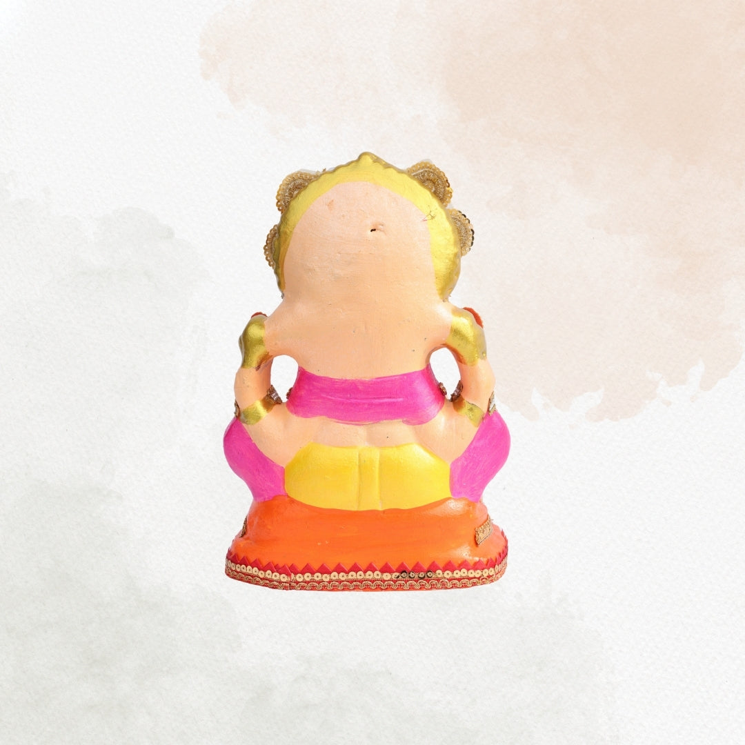 11 Inch – Vibrant Seated Ganesha Idol in Yellow Dhoti & Pink Shawl | Shadu Mitti Eco-Friendly Clay Murti with Grand Kundan Crown & Purple Base