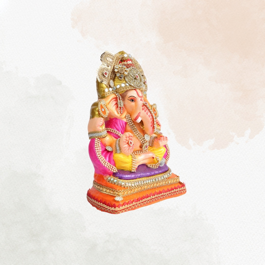 11 Inch – Vibrant Seated Ganesha Idol in Yellow Dhoti & Pink Shawl | Shadu Mitti Eco-Friendly Clay Murti with Grand Kundan Crown & Purple Base