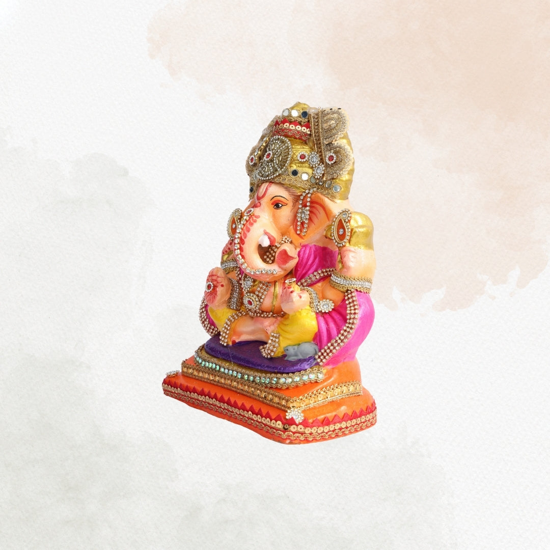 11 Inch – Vibrant Seated Ganesha Idol in Yellow Dhoti & Pink Shawl | Shadu Mitti Eco-Friendly Clay Murti with Grand Kundan Crown & Purple Base