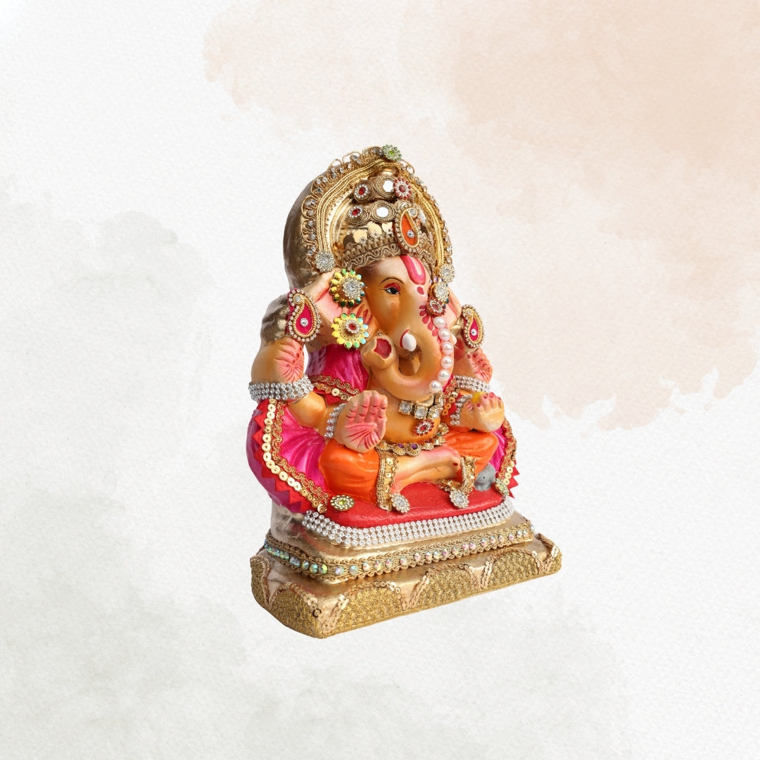 11 Inch – Royal Ganesha Idol in Orange Attire & Pink Shawl | Shadu Mitti Murti with Golden Crown & Beaded Embellishments