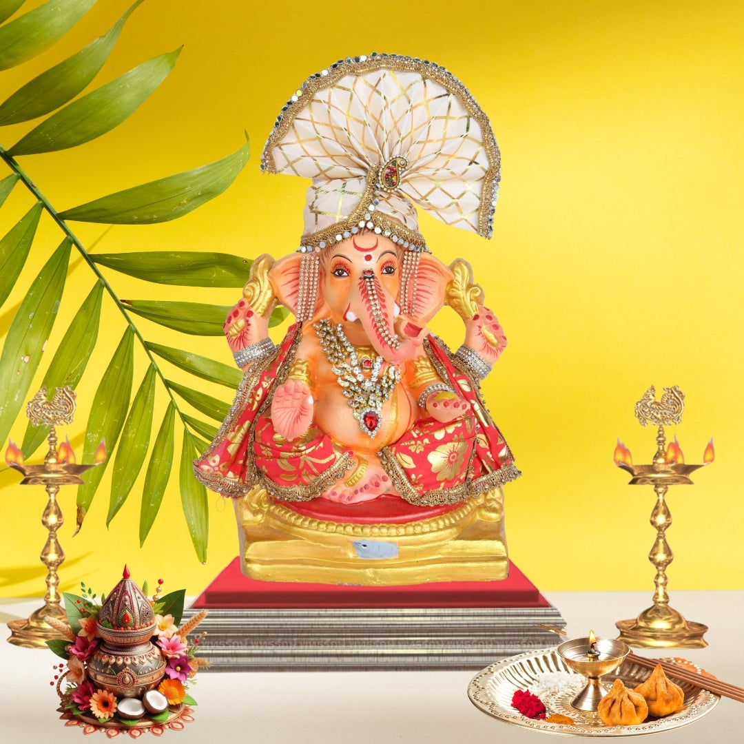 13 Inch – Majestic Seated Ganesha Idol in Red Floral Attire | Shadu Mitti Clay Murti with Cream Maharashtrian Pagdi & Stone Embellished Jewelry