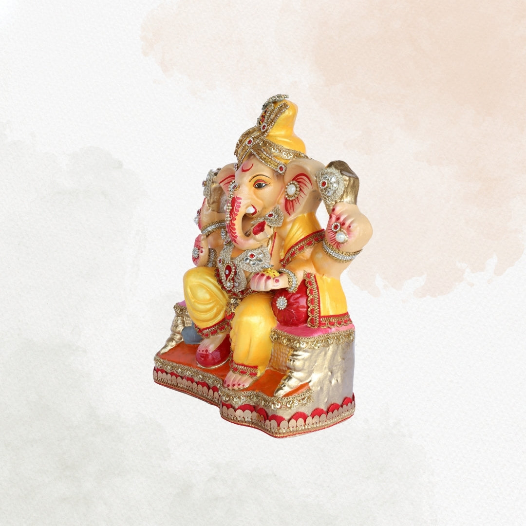 13 Inch – Royal Seated Ganesha Idol in Yellow Dhoti | Shadu Mitti Clay Murti with Bejeweled Golden Pagdi & Red Throne Base