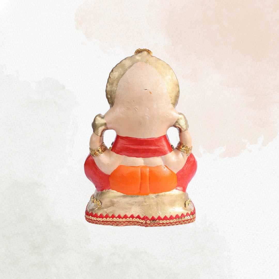 11 Inch – Royal Seated Ganesha Idol in Orange Attire | Shadu Mitti Clay Murti with Beaded Crown & Pearl Stone Work