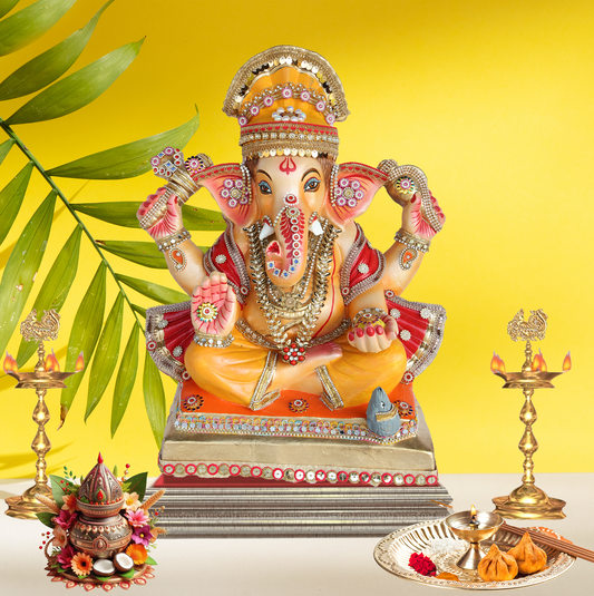 19 Inch – Divine Seated Ganesha Idol in Orange & Red Attire – Shadu Mitti Clay Murti with Golden Crown & Stone Embellishments