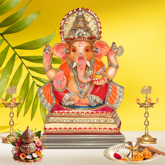 23 Inch –  Royal Seated Ganesha Idol in Orange Attire | Shadu Mitti Eco-Friendly Murti with Decorative Golden Crown & Stone Work