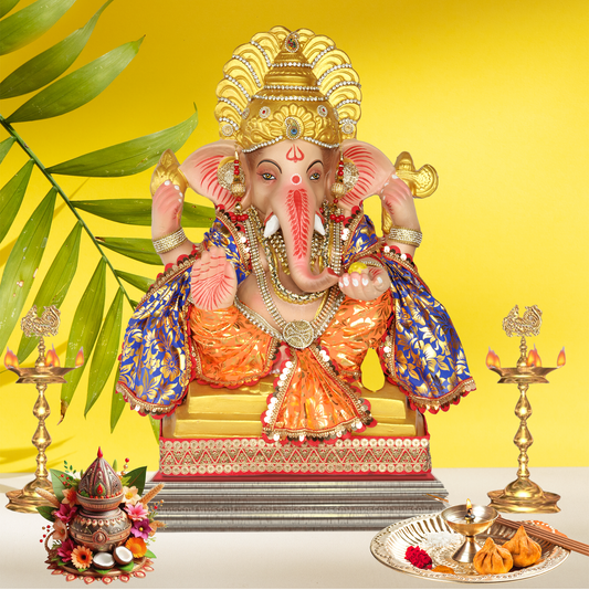 23 Inch – Elegant Seated Ganpati Idol in Orange & Blue Attire | Shadu Mitti Eco-Friendly Murti with Golden Crown & Traditional Floral Dupatta
