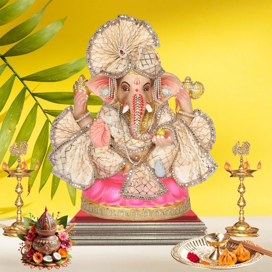 23 Inch – Elegant Seated Ganesha Idol in Cream Gold Attire | Shadu Mitti Clay Murti with Designer Fan-Style Pagdi & Pearl Stone Embellishments