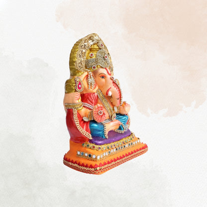 11 Inch – Majestic Seated Ganesha Idol in Blue Dhoti & Red Shawl | Shadu Mitti Eco-Friendly Clay Murti with Grand Gold Crown & Purple Elevated Pedestal Base