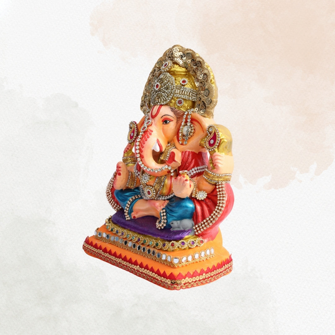 11 Inch – Majestic Seated Ganesha Idol in Blue Dhoti & Red Shawl | Shadu Mitti Eco-Friendly Clay Murti with Grand Gold Crown & Purple Elevated Pedestal Base