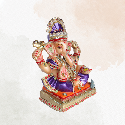 19 Inch – Divine Seated Ganesha Idol in Purple Attire – Shadu Mitti Clay Murti with Stone-Studded Crown & Orange Base