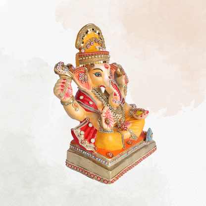 19 Inch – Divine Seated Ganesha Idol in Orange & Red Attire – Shadu Mitti Clay Murti with Golden Crown & Stone Embellishments