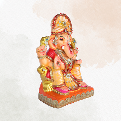 17 Inch – Royal Seated Ganesha Idol in Orange-Yellow Attire | Shadu Mitti Clay Murti with Fan Crown & Kundan Embellishments
