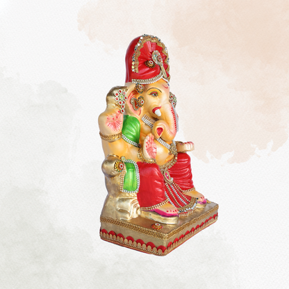 17 Inch – Royal Seated Ganesha Idol in Red Dhoti | Eco-Friendly Shadu Mitti Murti with Elegant Red Pagdi & Crystal Jewelry