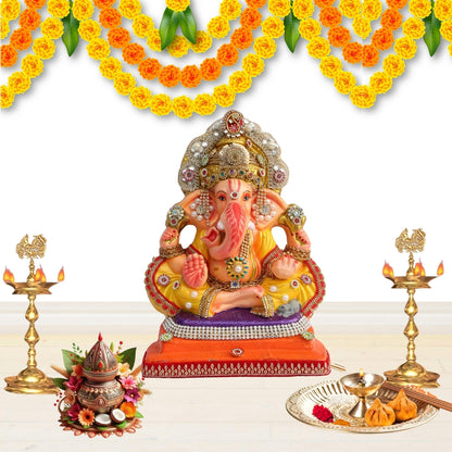 11 Inch – Divine Seated Ganesha Idol in Yellow Attire | Shadu Mitti Clay Murti with Silver Crown & Multistone Work