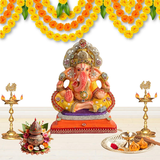 11 Inch – Divine Seated Ganesha Idol in Yellow Attire | Shadu Mitti Clay Murti with Silver Crown & Multistone Work