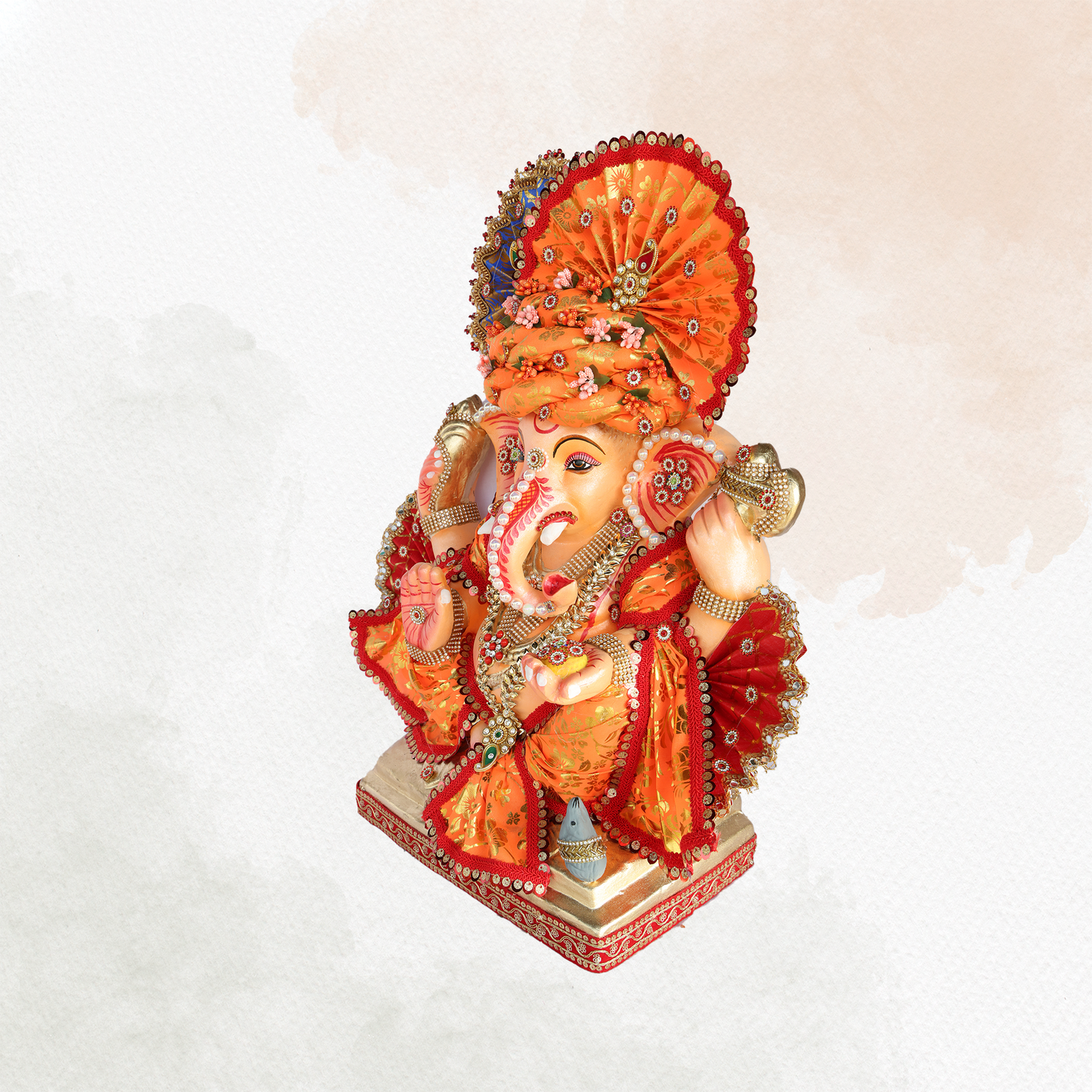 19 Inch – Traditional Orange Attired Ganesha Idol – Shadu Mitti Clay Murti with Floral Pagdi & Designer Fan