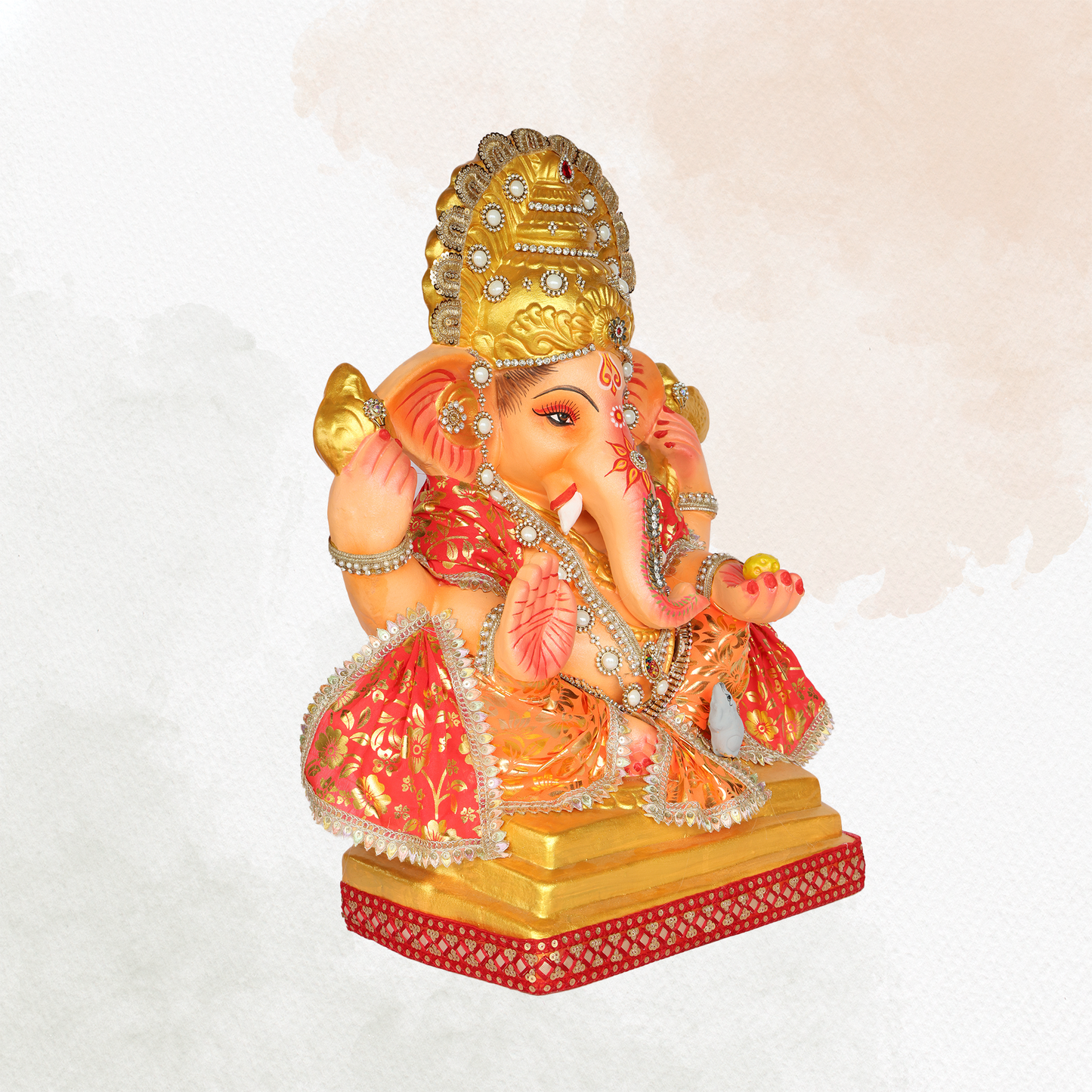 23 Inch – Traditional Seated Ganesha Idol in Red & Orange Floral Attire | Shadu Mitti Clay Murti with Golden Crown & Pearl Jewelry