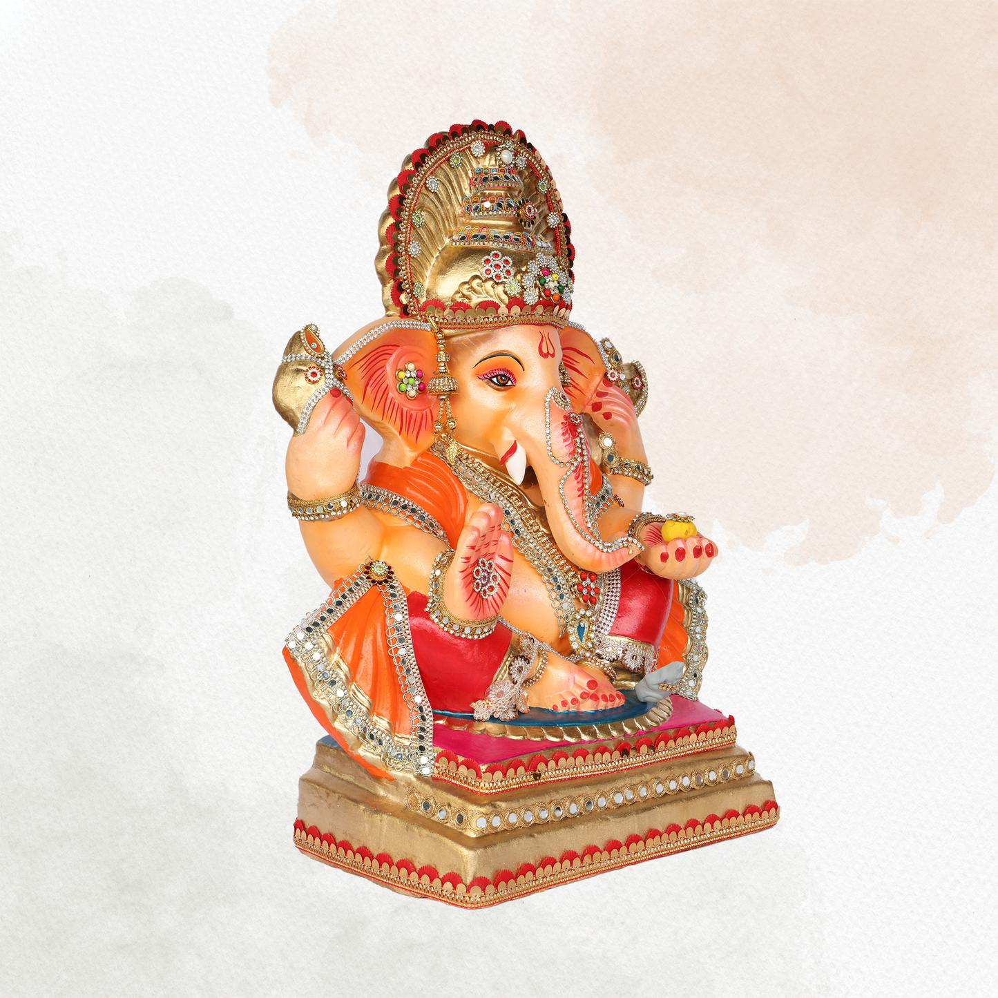 23 Inch –  Royal Seated Ganesha Idol in Orange Attire | Shadu Mitti Eco-Friendly Murti with Decorative Golden Crown & Stone Work