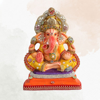 11 Inch – Divine Seated Ganesha Idol in Yellow Attire | Shadu Mitti Clay Murti with Silver Crown & Multistone Work