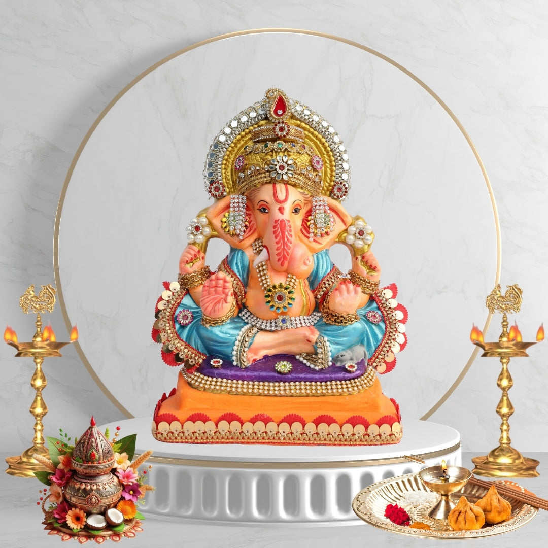 11 Inch – Grand Seated Ganesha Idol in Blue Attire | Shadu Mitti Clay Murti with Gold Crown & Designer Stonework Base