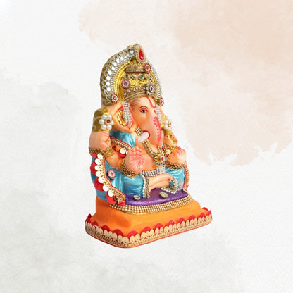 11 Inch – Grand Seated Ganesha Idol in Blue Attire | Shadu Mitti Clay Murti with Gold Crown & Designer Stonework Base