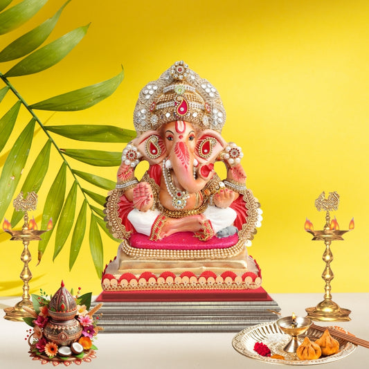 11 Inch – Royal Seated Ganesha Idol in White Dhoti | Shadu Mitti Clay Murti with Golden Crown & Red Pearl Detailing