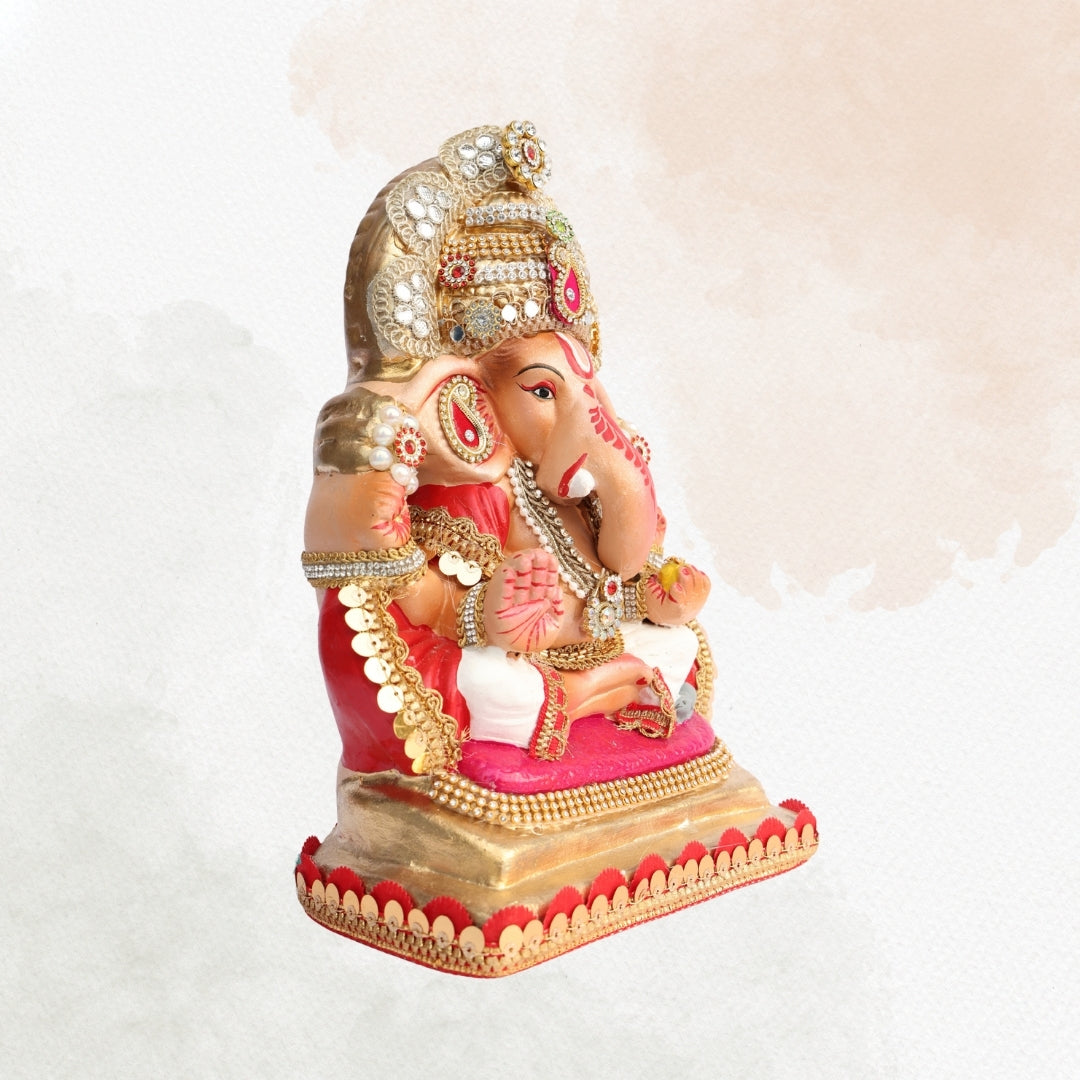 11 Inch – Royal Seated Ganesha Idol in White Dhoti | Shadu Mitti Clay Murti with Golden Crown & Red Pearl Detailing