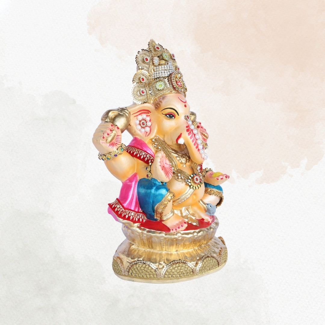 13 Inch – Regal Seated Ganesha Idol in Pink & Blue Attire – Shadu Mitti Clay Murti with Golden Crown & Stone Work