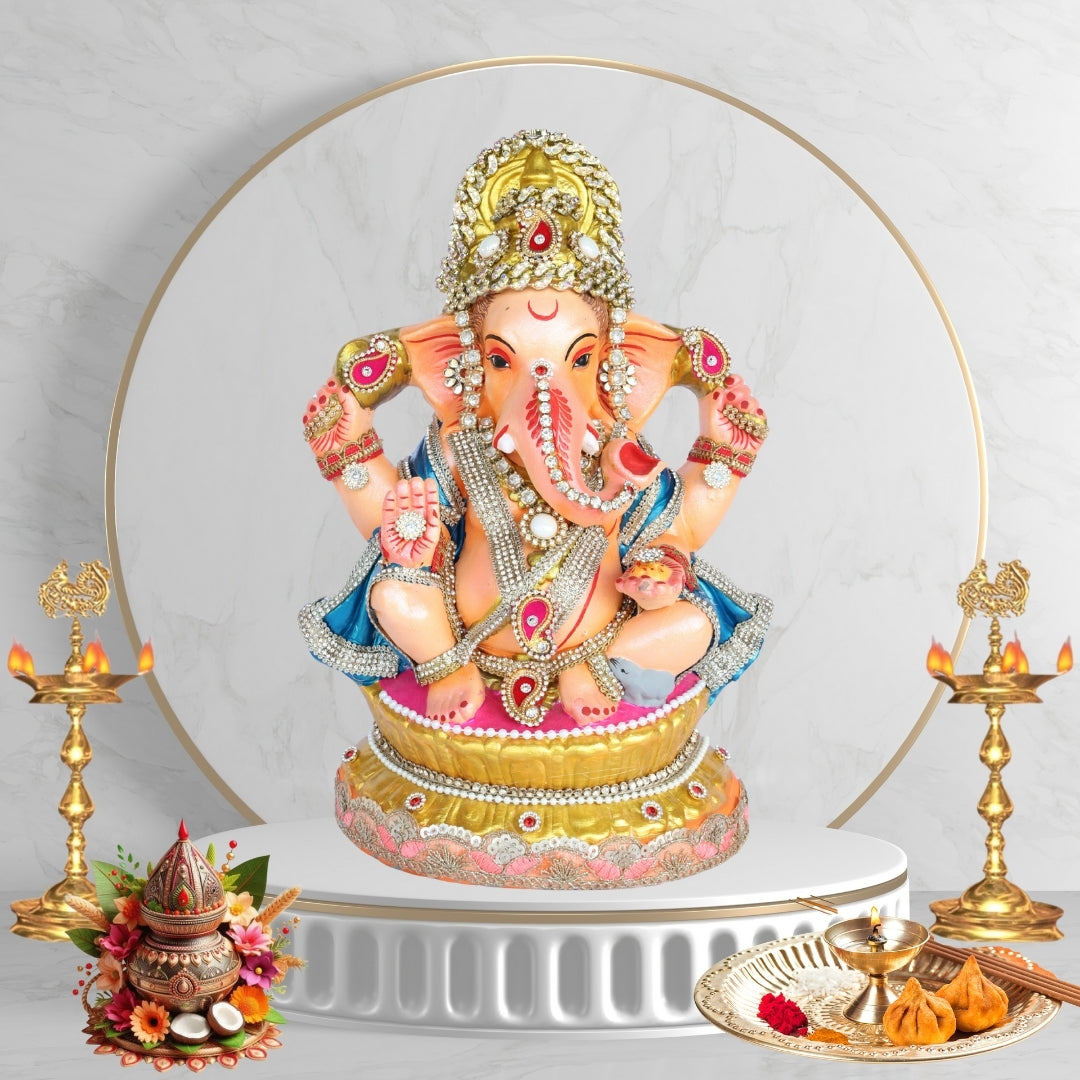 13 Inch – Divine Seated Ganesha Idol in Blue Attire – Shadu Mitti Clay Murti with Grand Golden Crown & Pearl Work