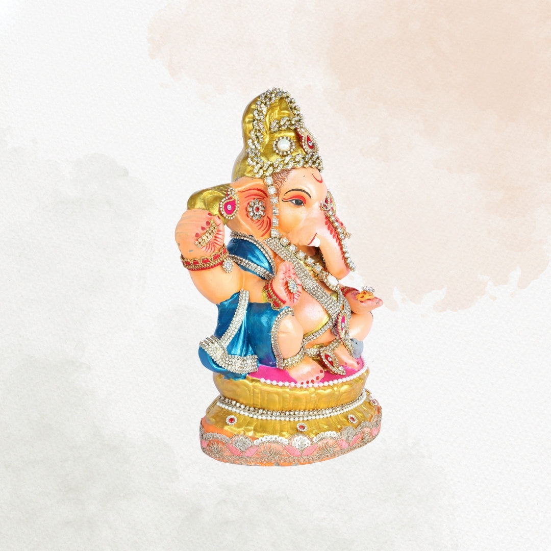 13 Inch – Divine Seated Ganesha Idol in Blue Attire – Shadu Mitti Clay Murti with Grand Golden Crown & Pearl Work