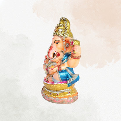 13 Inch – Divine Seated Ganesha Idol in Blue Attire – Shadu Mitti Clay Murti with Grand Golden Crown & Pearl Work