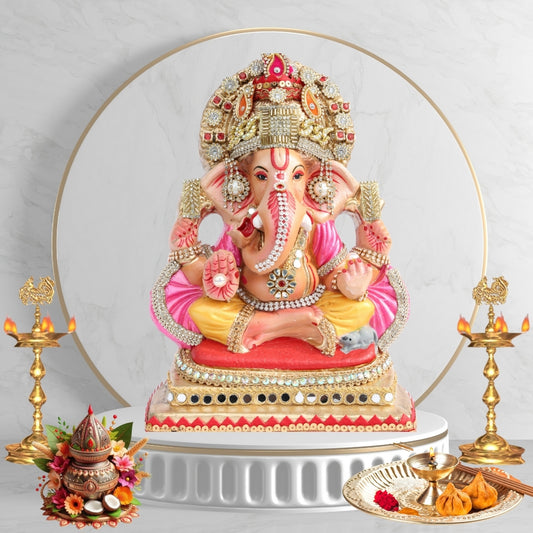 11 Inch – Elegant Seated Ganesha Idol in Pink-Yellow Attire | Shadu Mitti Eco-Friendly Murti with Heavy Golden Crown & Pearl Detailing