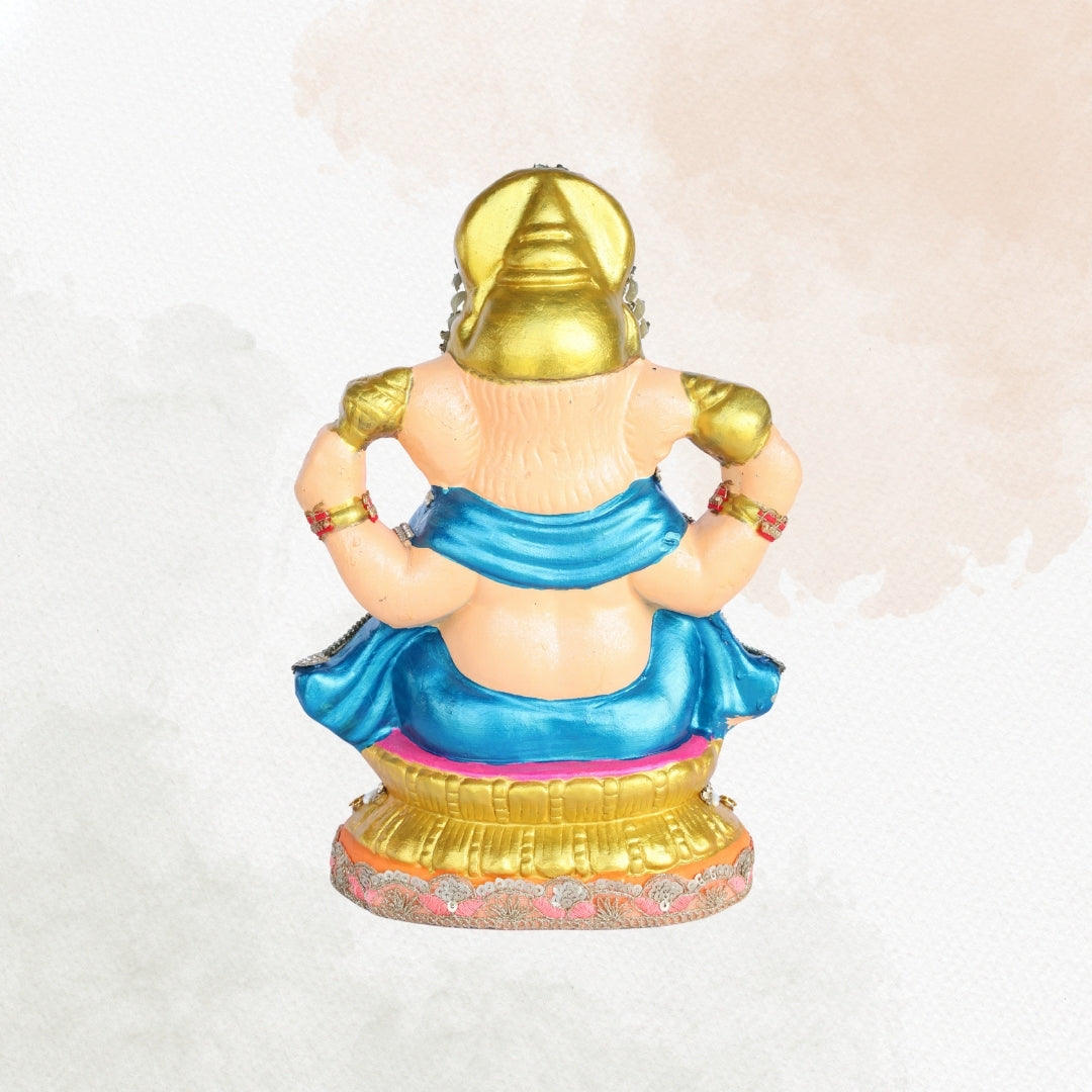 13 Inch – Divine Seated Ganesha Idol in Blue Attire – Shadu Mitti Clay Murti with Grand Golden Crown & Pearl Work