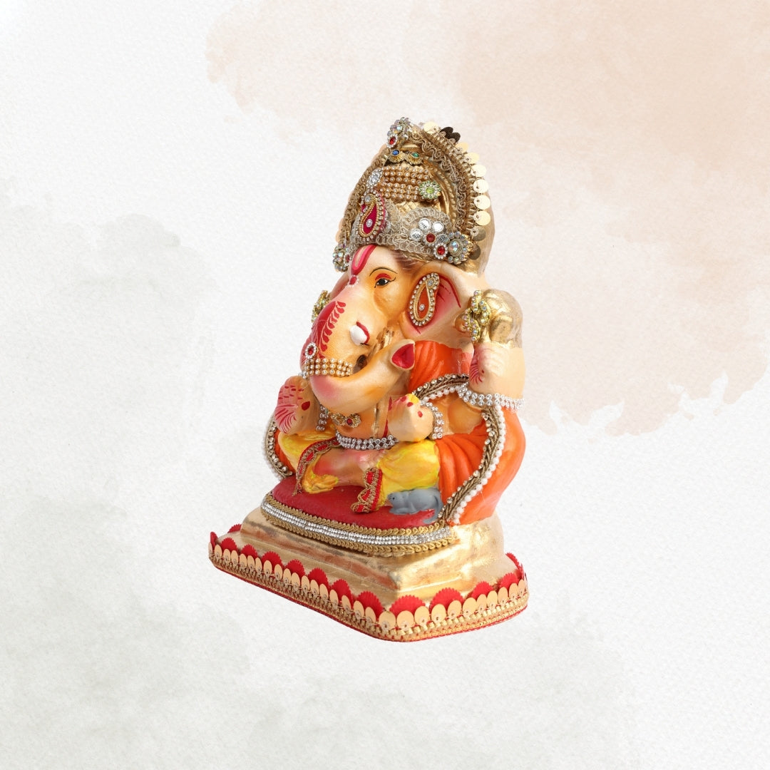11 Inch – Ganesha Idol in Golden-Yellow Dhoti with Ornate Crown | Eco-Friendly Shadu Mitti Ganpati Murti with Orange Drape & Royal Embellishments