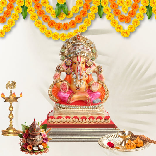 11 Inch – Ganesha Idol in Pink-Orange Attire with Grand Golden Crown | Eco-Friendly Shadu Mitti Ganpati Murti with Sparkling Detailing & Classic Seated Pose