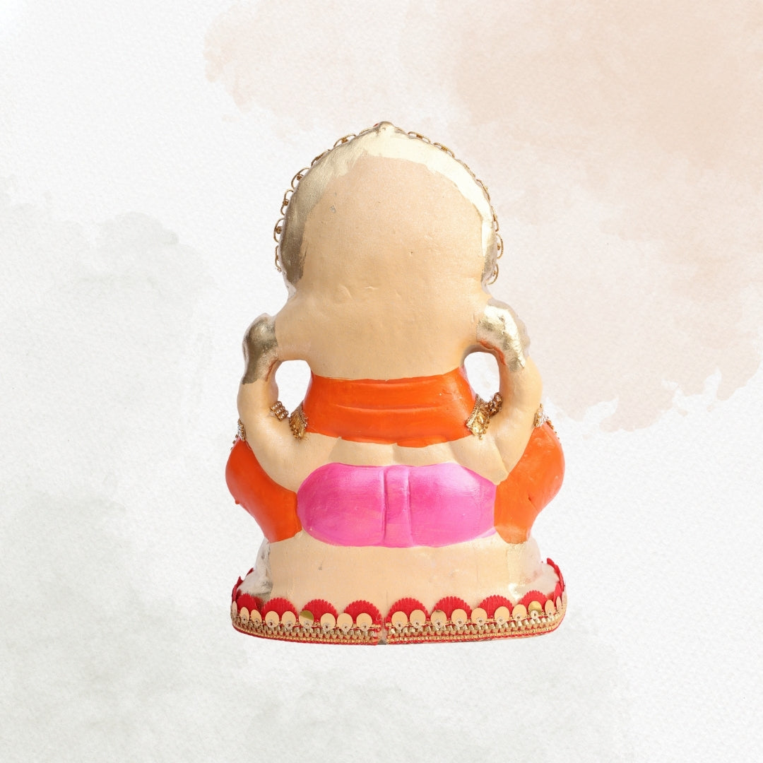 11 Inch – Ganesha Idol in Pink-Orange Attire with Grand Golden Crown | Eco-Friendly Shadu Mitti Ganpati Murti with Sparkling Detailing & Classic Seated Pose