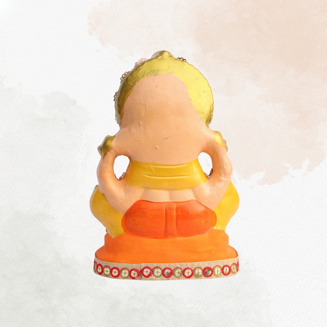 11 Inch – Ganesha Idol in Yellow-Orange Attire with Majestic Red-Green Bejeweled Crown | Eco-Friendly Shadu Mitti Ganpati Murti