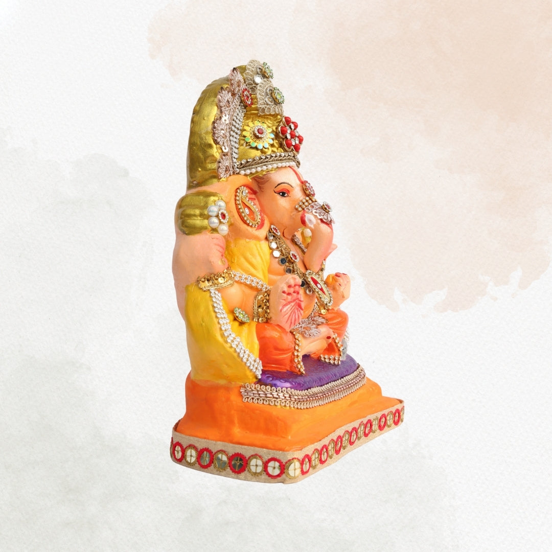 11 Inch – Ganesha Idol in Yellow-Orange Attire with Majestic Red-Green Bejeweled Crown | Eco-Friendly Shadu Mitti Ganpati Murti