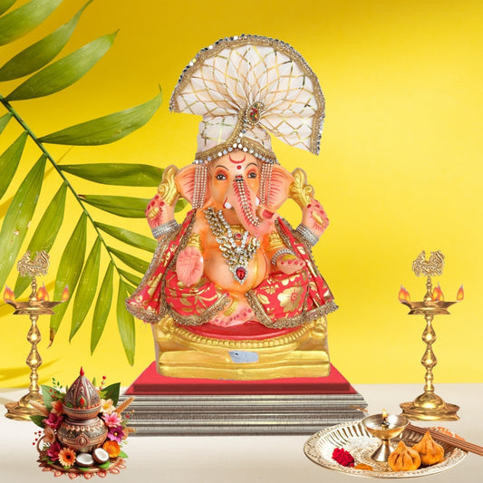 13 Inch – Majestic Seated Ganesha Idol in Red Floral Attire | Shadu Mitti Clay Murti with Cream Maharashtrian Pagdi & Stone Embellished Jewelry