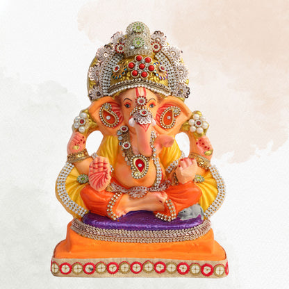 11 Inch – Ganesha Idol in Yellow-Orange Attire with Majestic Red-Green Bejeweled Crown | Eco-Friendly Shadu Mitti Ganpati Murti