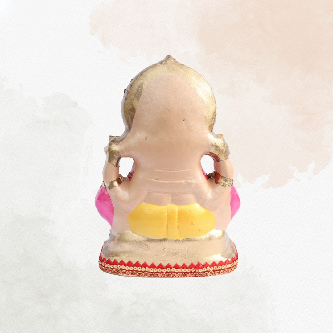 11 Inch – Elegant Seated Ganesha Idol in Pink-Yellow Attire | Shadu Mitti Eco-Friendly Murti with Heavy Golden Crown & Pearl Detailing
