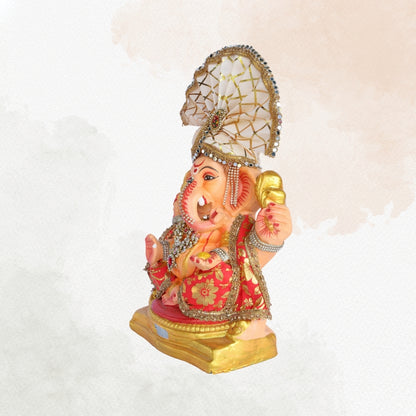 13 Inch – Majestic Seated Ganesha Idol in Red Floral Attire | Shadu Mitti Clay Murti with Cream Maharashtrian Pagdi & Stone Embellished Jewelry