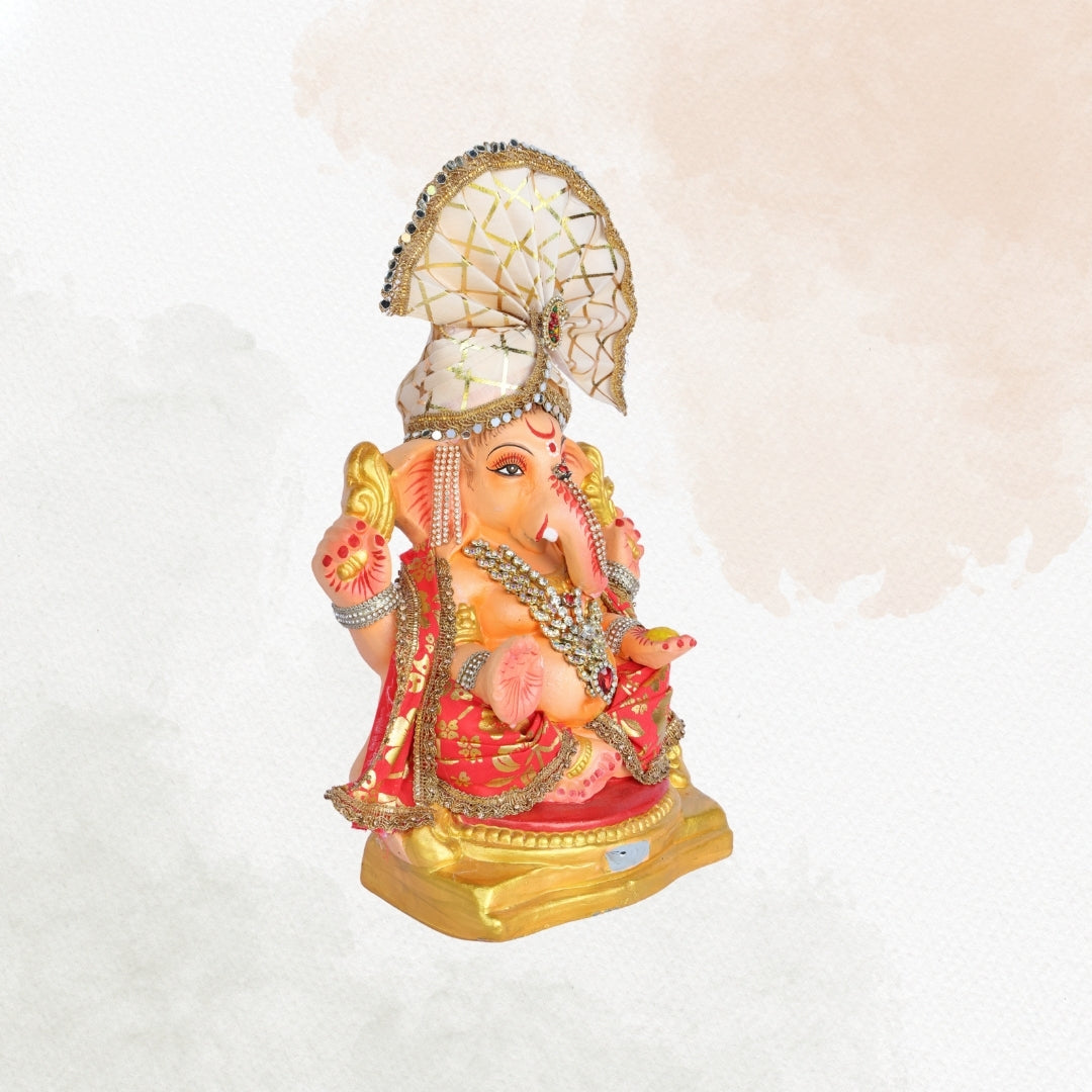 13 Inch – Majestic Seated Ganesha Idol in Red Floral Attire | Shadu Mitti Clay Murti with Cream Maharashtrian Pagdi & Stone Embellished Jewelry