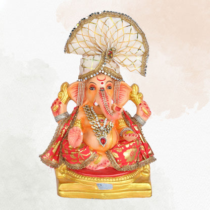 13 Inch – Majestic Seated Ganesha Idol in Red Floral Attire | Shadu Mitti Clay Murti with Cream Maharashtrian Pagdi & Stone Embellished Jewelry