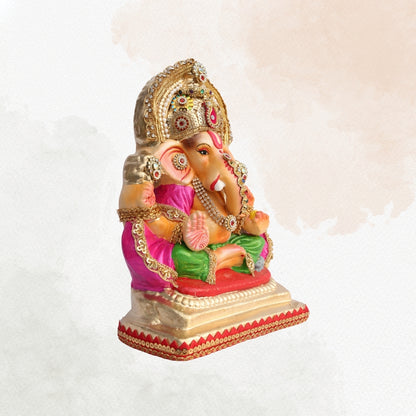 11 Inch – Traditional Ganesha Idol in Magenta & Green Attire | Shadu Mitti Murti with Kundan Crown & Ornamental Detailing