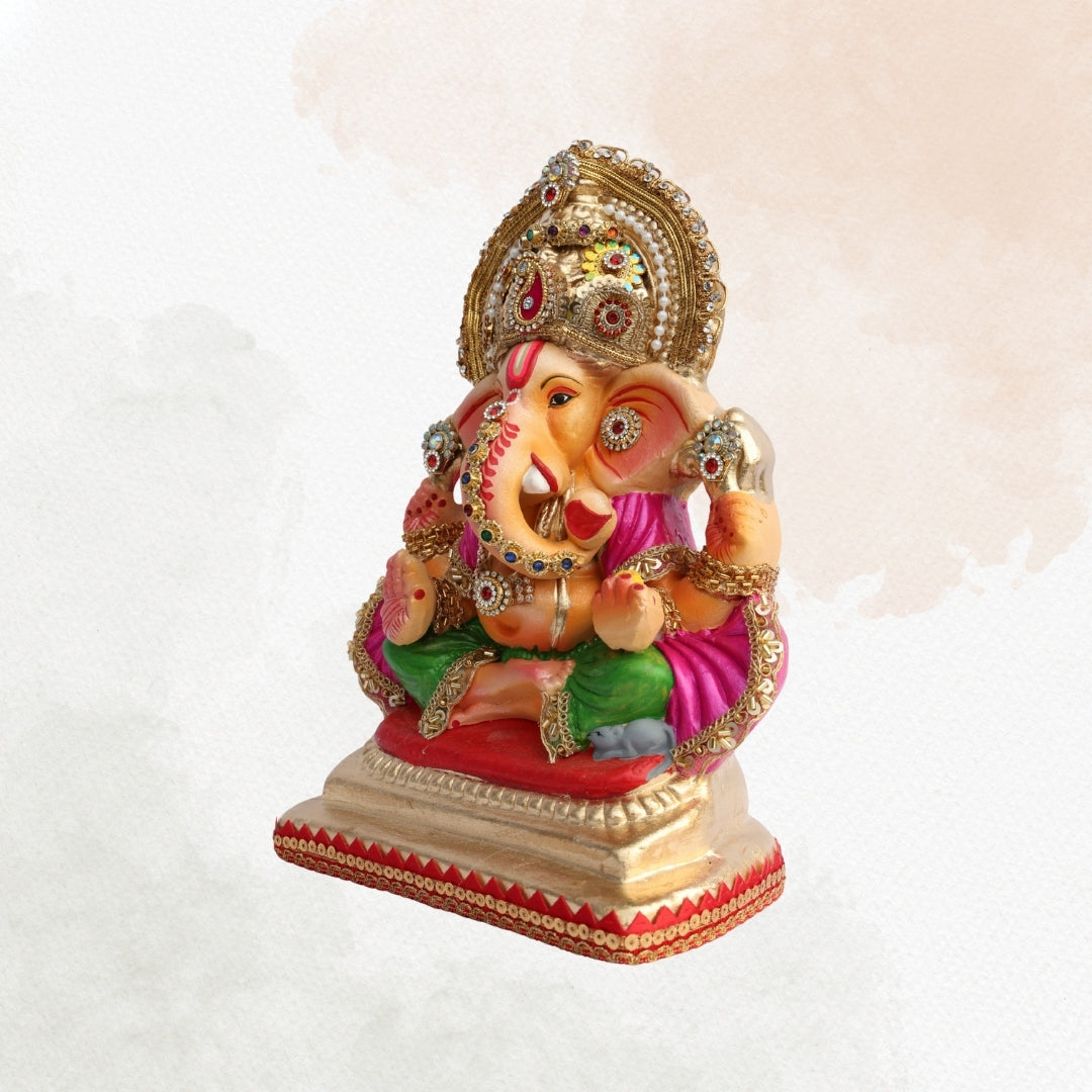 11 Inch – Traditional Ganesha Idol in Magenta & Green Attire | Shadu Mitti Murti with Kundan Crown & Ornamental Detailing