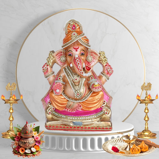 13 Inch – Regal Seated Ganesha Idol in Orange-Pink Attire Shadu Mitti Clay Murti with Gold Crown & Stone Work