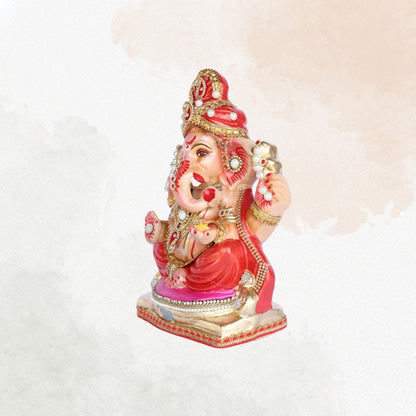 13 Inch – Traditional Sitting Ganesha Idol in Red Shadu Mitti with Golden Crown & Pearl Stone Adornments