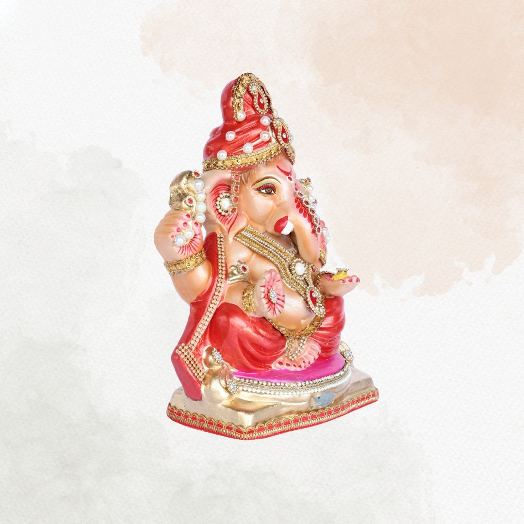 13 Inch – Traditional Sitting Ganesha Idol in Red Shadu Mitti with Golden Crown & Pearl Stone Adornments